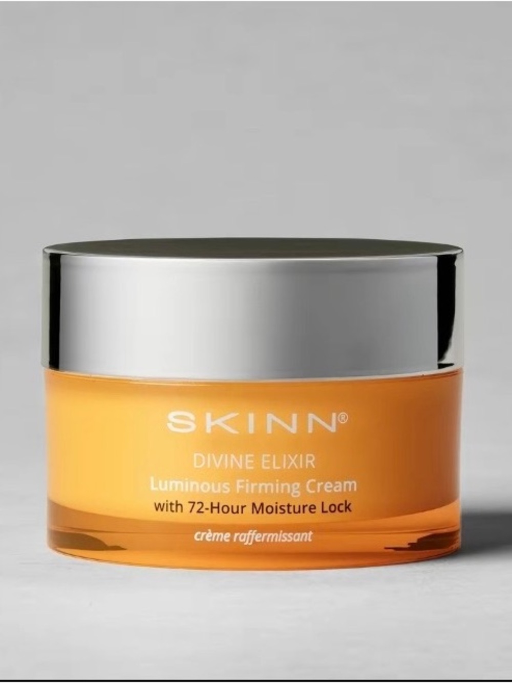 SKINN Divine Elixir Luminous Firming Cream - Orange and Silver Jar